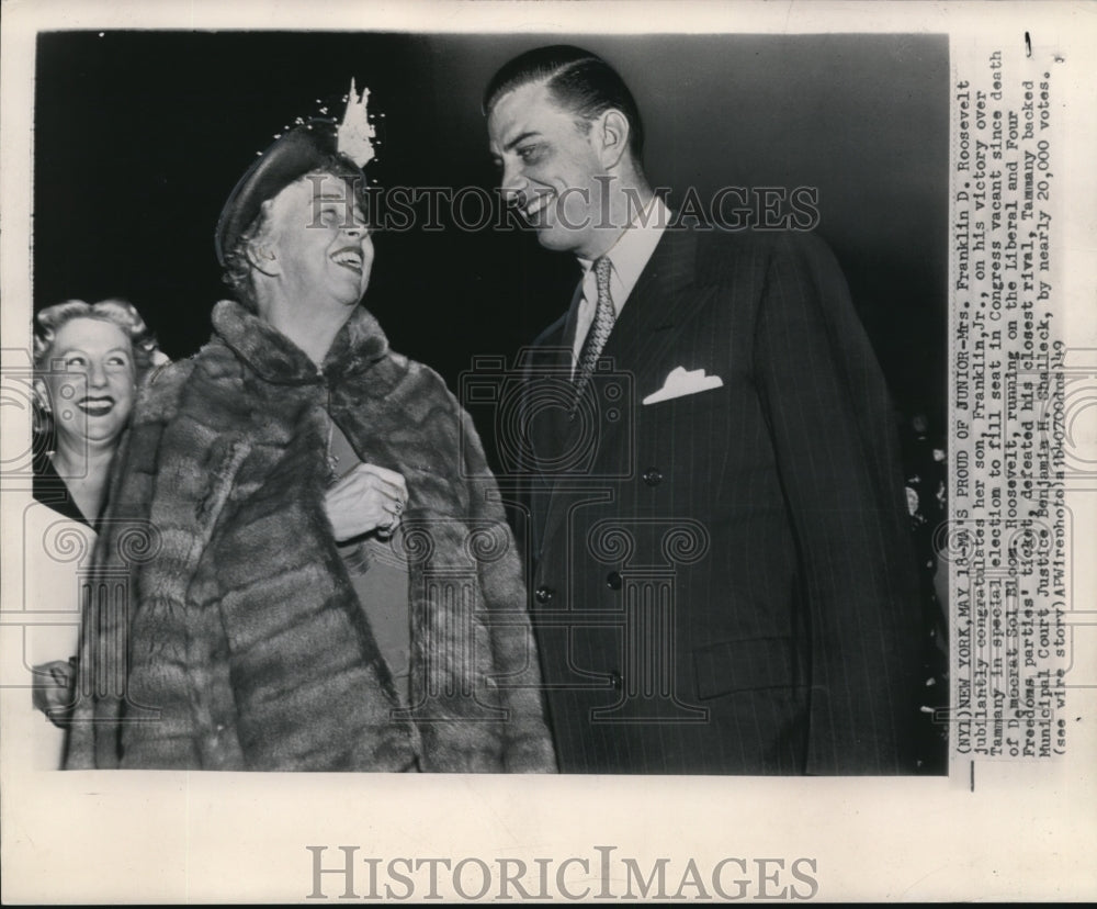 1949 Press Photo Mrs. Franklin D. Roosevelt jubilantly congratulates her son, - Historic Images