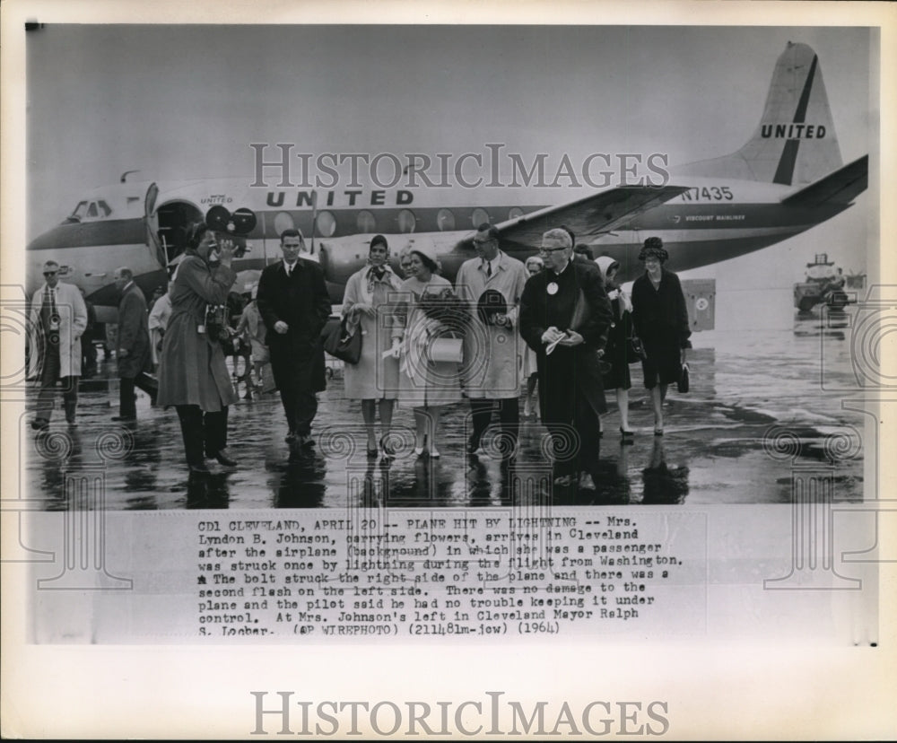 1964 Wire Photo Mrs. Johnson arrives safely after plane hit by lightning - Historic Images