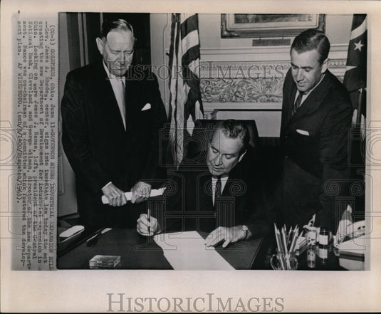 1963 Press Photo Gov. Rhodes signs Indrustrial expansion billi in Ohio - Historic Images