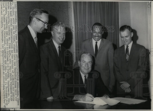 1967 Press Photo Gov. Rhodes signs House Bill 457, an Anti-discriminating bill - Historic Images
