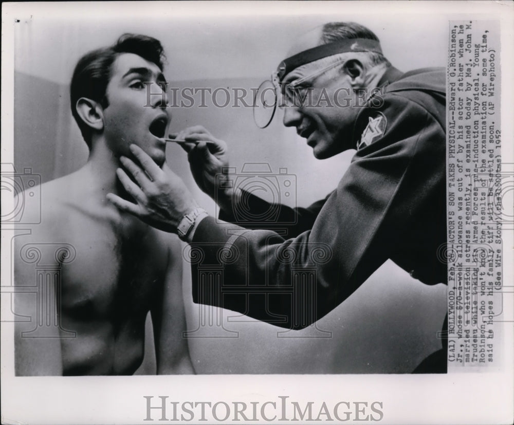 1952 Press Photo Edward G. Robinson Jr.Examined by Maj.John M.Trudeau - Historic Images