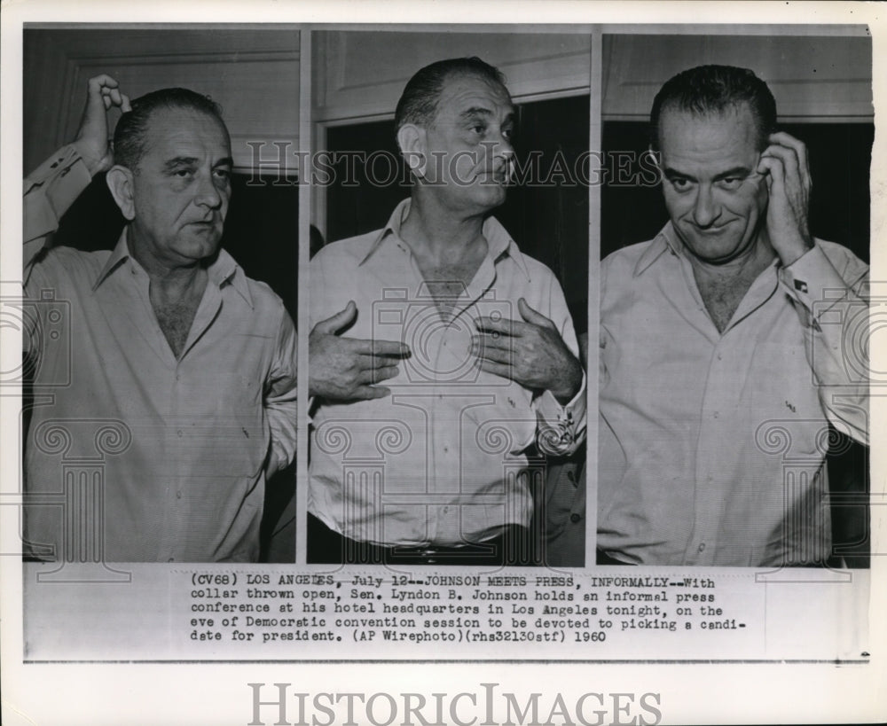 1960 Press Photo With collar thrown open, Sen. Lyndon B. Johnson holds an - Historic Images