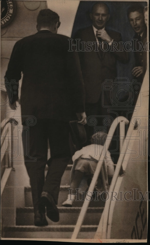 1963 Press Photo Pres. Keenedy follows his son John Jr. up the plane Ramp. - Historic Images