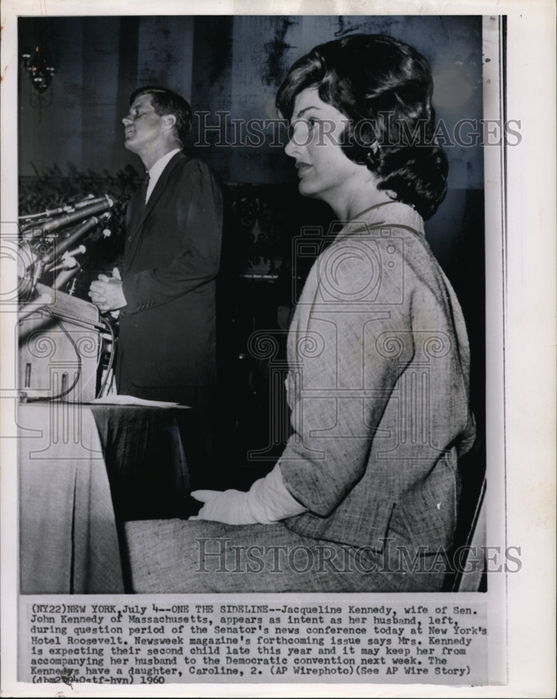 1960 Press Photo Jacqueline Kennedy appears as intent as her husband during - Historic Images