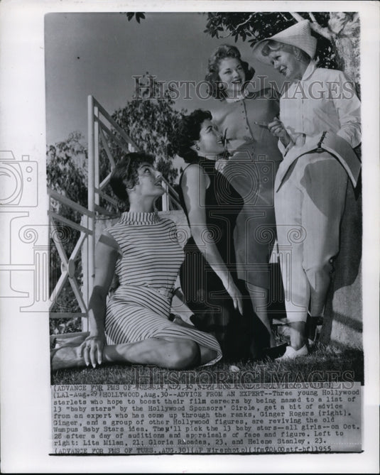 1955 Press Photo Rogers and other Hollywood figures get a advice from an expert - Historic Images