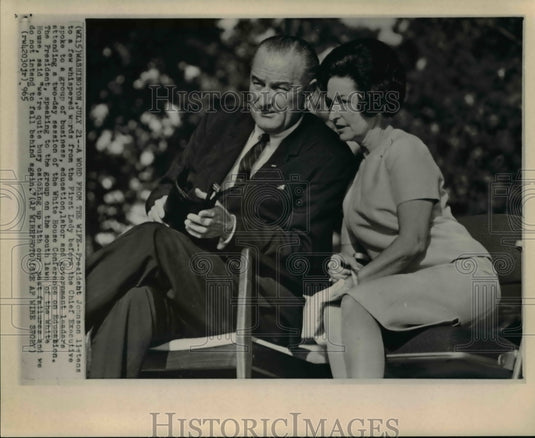 1965 Wire Photo Pres Johnson listens to First Lady before Conference - Historic Images