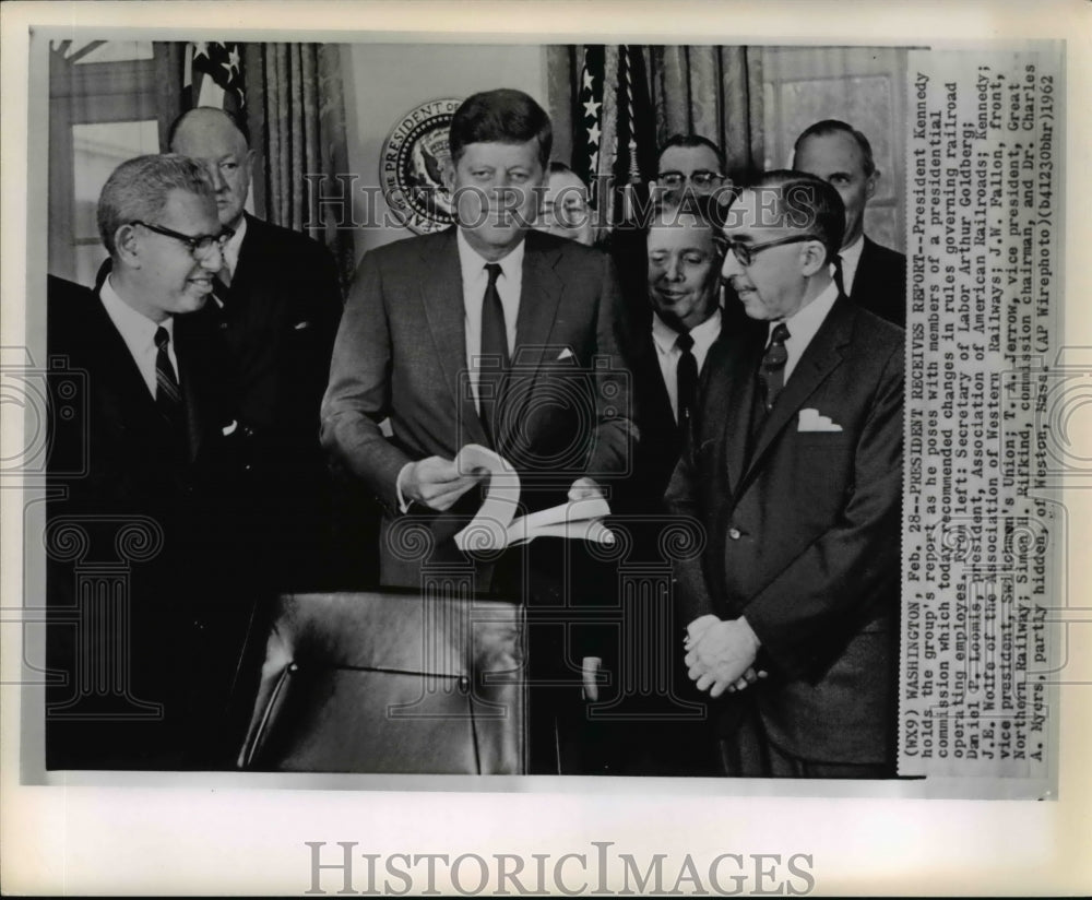 1962 Press Photo Pres. Kennedy holds the group&#39;s report of Presidential comm. - Historic Images