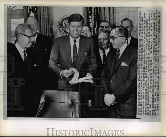 1962 Press Photo Pres. Kennedy holds the group's report of Presidential comm. - Historic Images