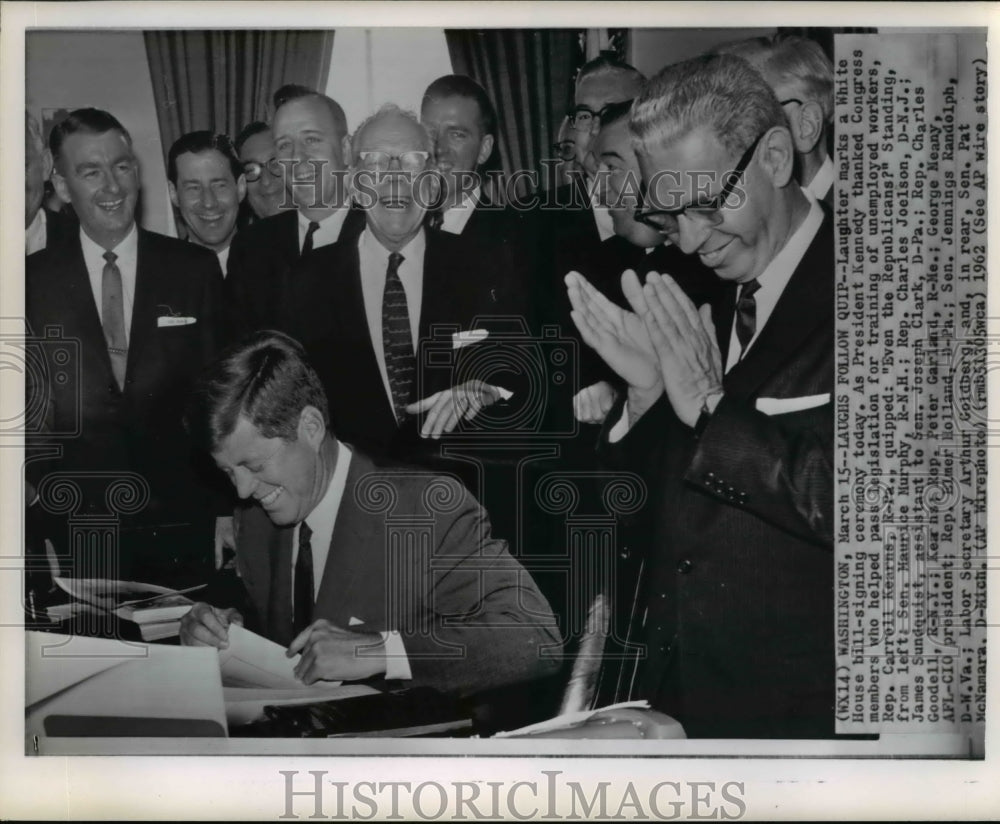 1962 Press Photo Laughter marks a White House bill-signing ceremony - Historic Images