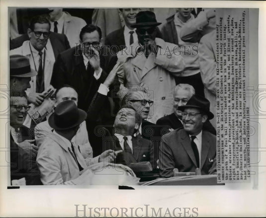 1962 Press Photo Pres Kennedy amuses companions at the Distr of Columbia stadium - Historic Images