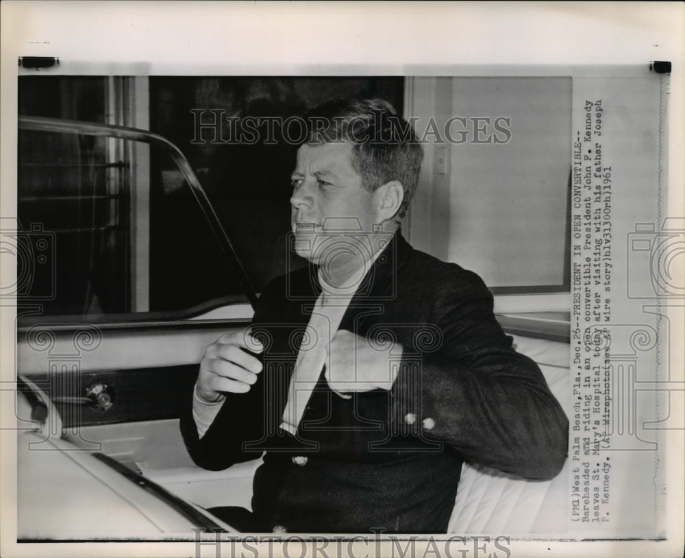 1961 Press Photo Pres John F Kennedy leave St Mary&#39;s Hospital aftr visit father - Historic Images