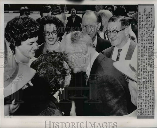 1961 Press Photo Surrounded by kinfolks, Secretary of State Dean Rusk kisses his - Historic Images