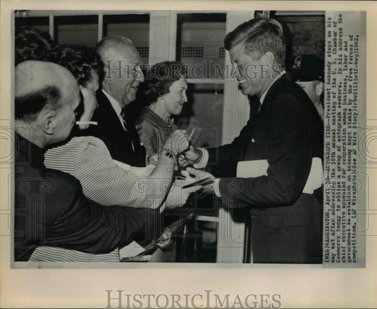 1962 Press Photo Kennedy with autograph seekers at 50th Annual Meeting of USCC - Historic Images