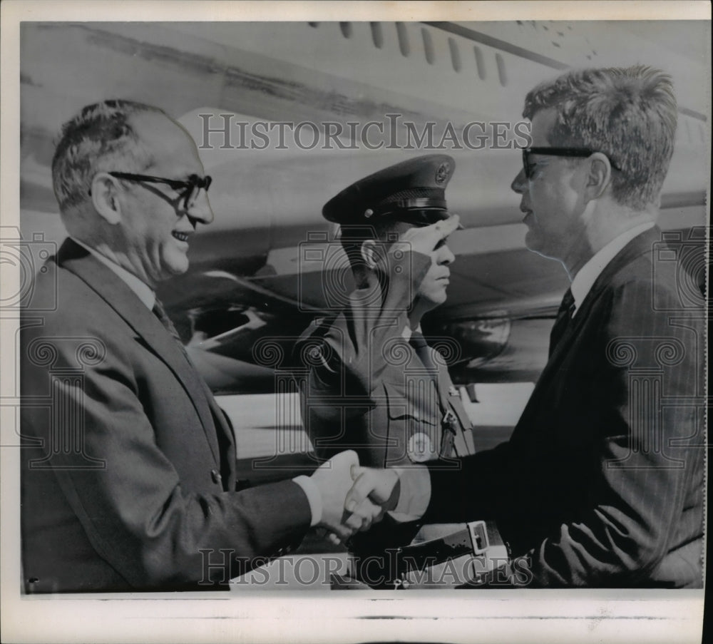 1961 Pres. Kennedy greets Argentine Pres. Frondizi at airport - Historic Images