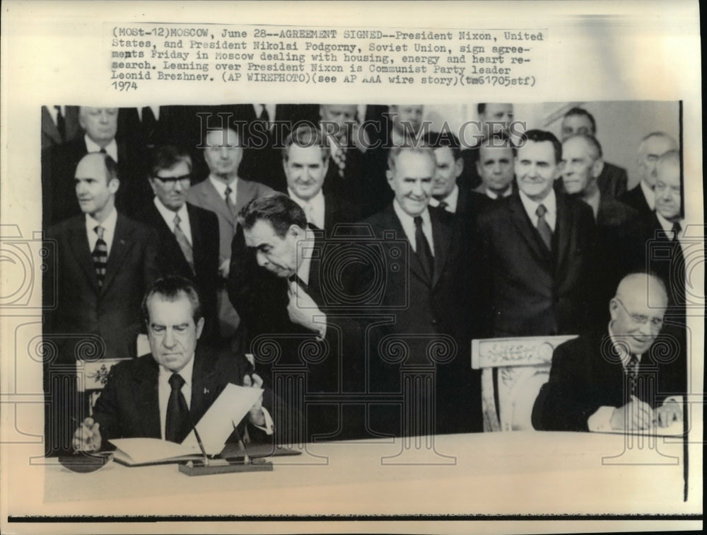 1974 Press Photo Nixon&amp;Podgorny signs agreement in Moscow with Brezhnev - Historic Images