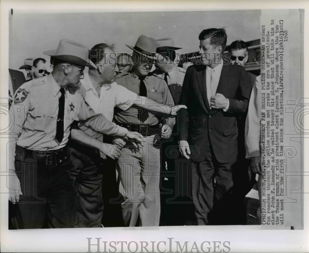 1960 Press Photo Kennedy Fan breaks Police Guard as he walked toward his plane - Historic Images