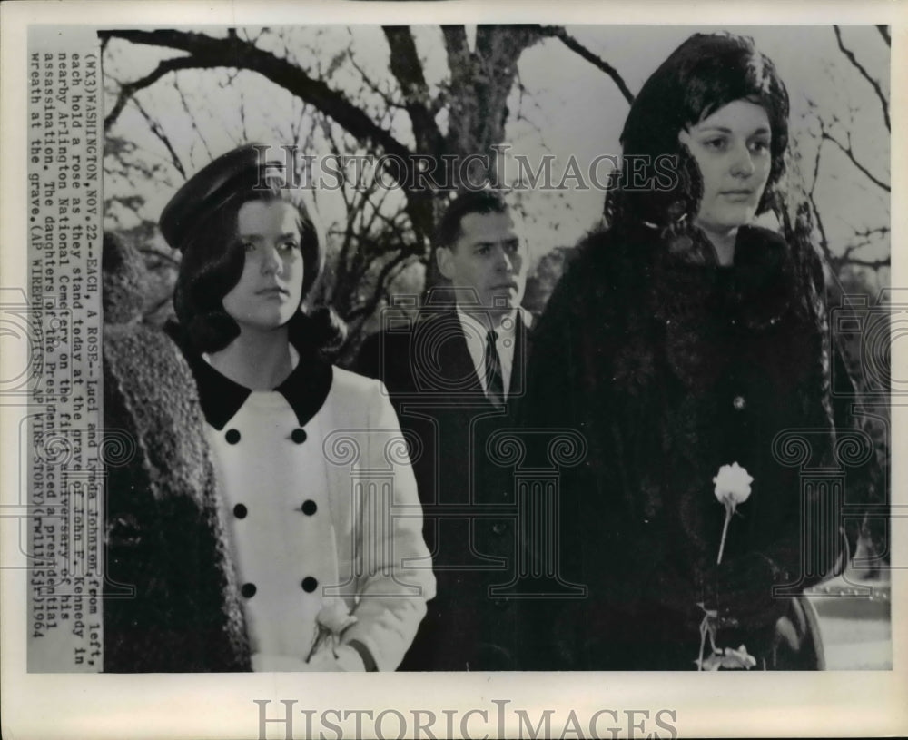 1964 Press Photo Johnsons stand at the grave of Kennedy in Arlington Cemetery - Historic Images