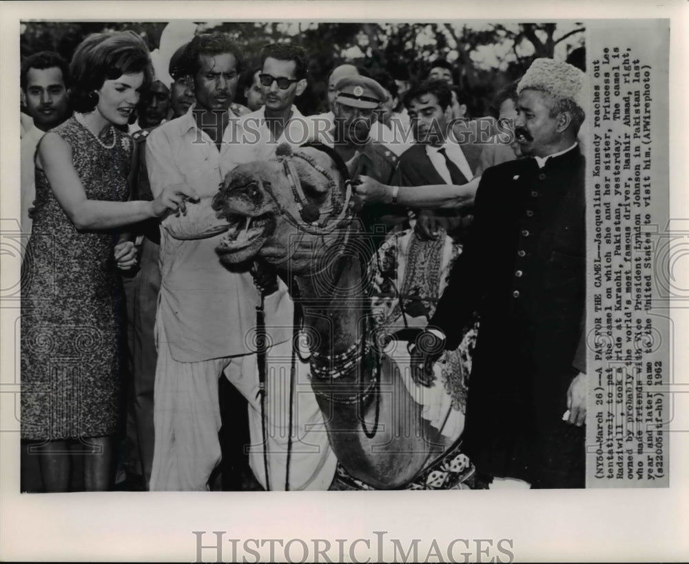 1962 Press Photo Jacqueline Kennedy pats camel on which she &amp; sister took a ride - Historic Images