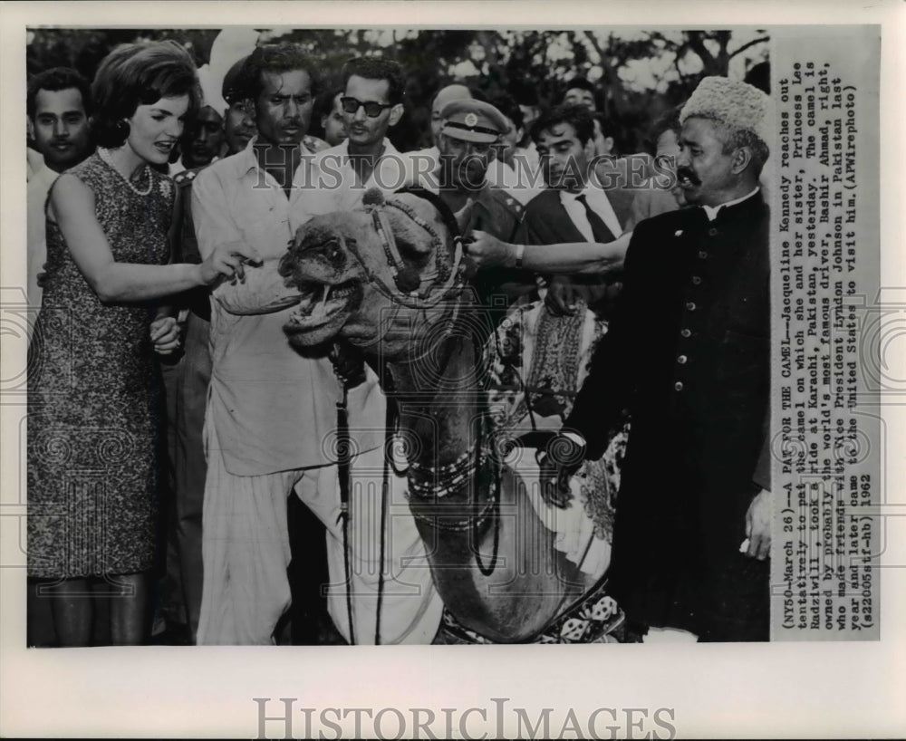 1962 Press Photo Jacqueline Kennedy pats camel on which she & sister took a ride - Historic Images