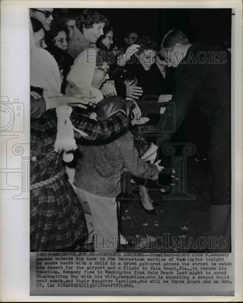 1960 Press Photo President-elect John F. Kennedy pauses outside his home in the - Historic Images
