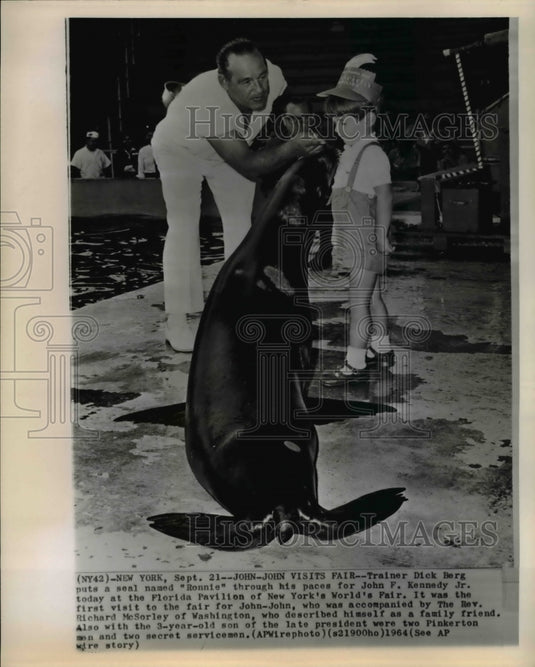 1964 Press Photo Trainer Dick Berg with John Kennedy Jr. at N.Y. World's Fair. - Historic Images