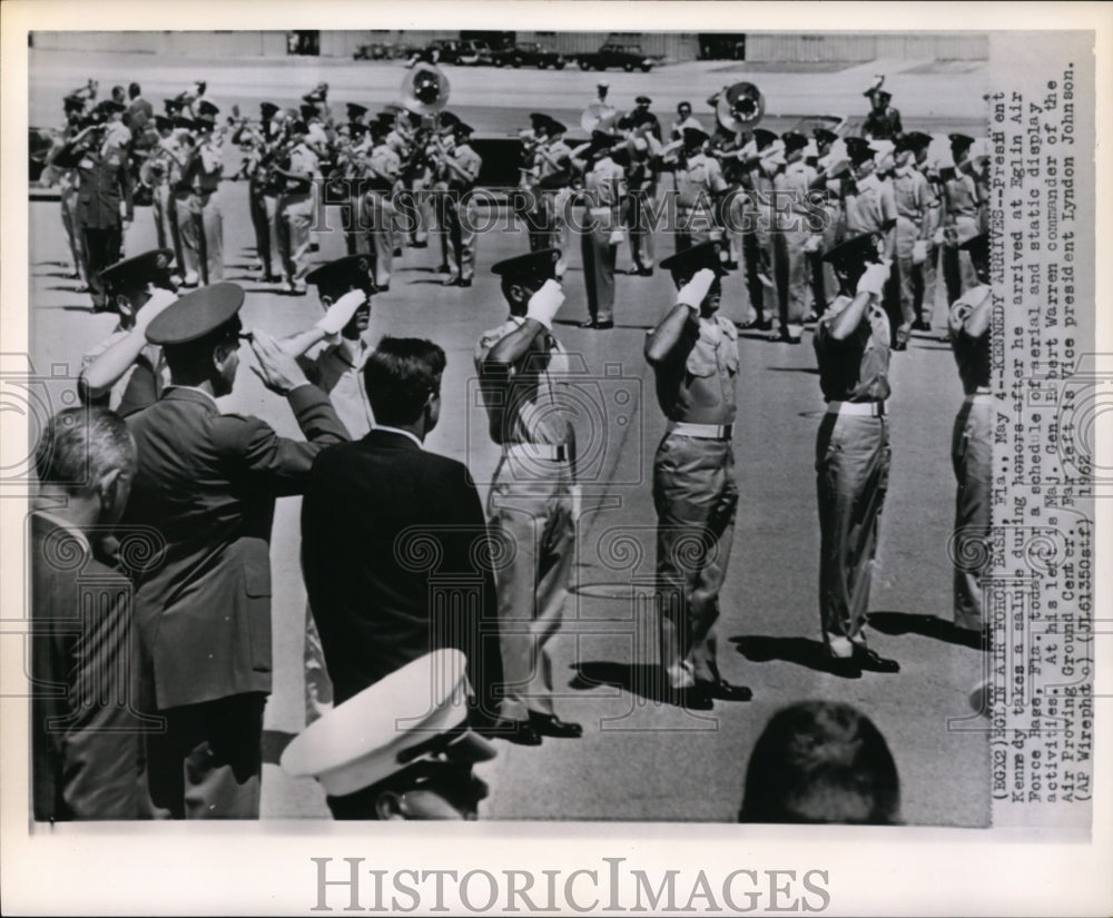 1962 Press Photo Pres Kennedy takes salute during honors at Eglin Air Force Base - Historic Images