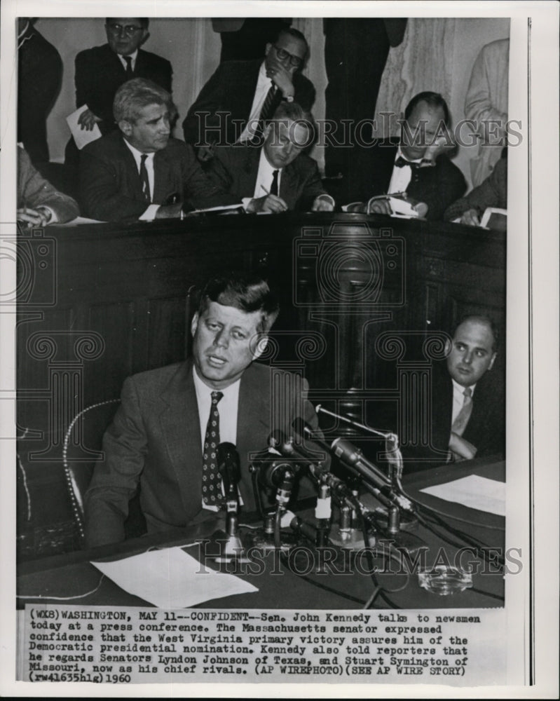 1960 Press Photo Sen. Kennedy talks to newsmen at press conference - Historic Images