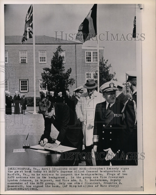 1962 Press Photo Pres. Kennedy signs guest list at NATO's Supreme Allied Command - Historic Images