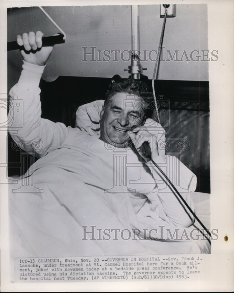 1953 Gov. Frank J. Lausche joked with newsmen at a bedside - Historic Images