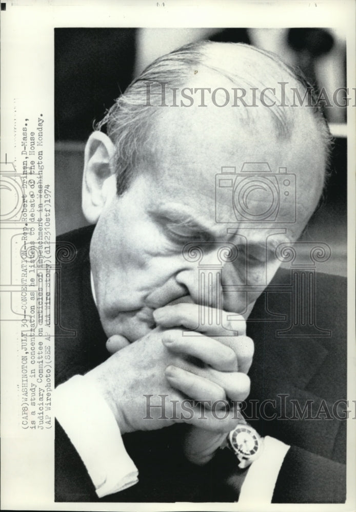 1974 Press Photo Rep. Robert Drinan is a study in concentration as he listens - Historic Images