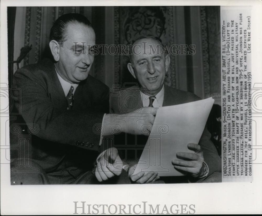 1951 Sen. Lyndon Johnson and Richard Russell holds a copy of bill. - Historic Images