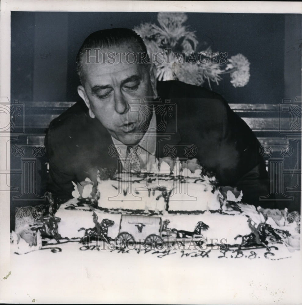 1960 Press Photo Sen.L.Johnson Blows Out Candles on Birthday Cake - Historic Images