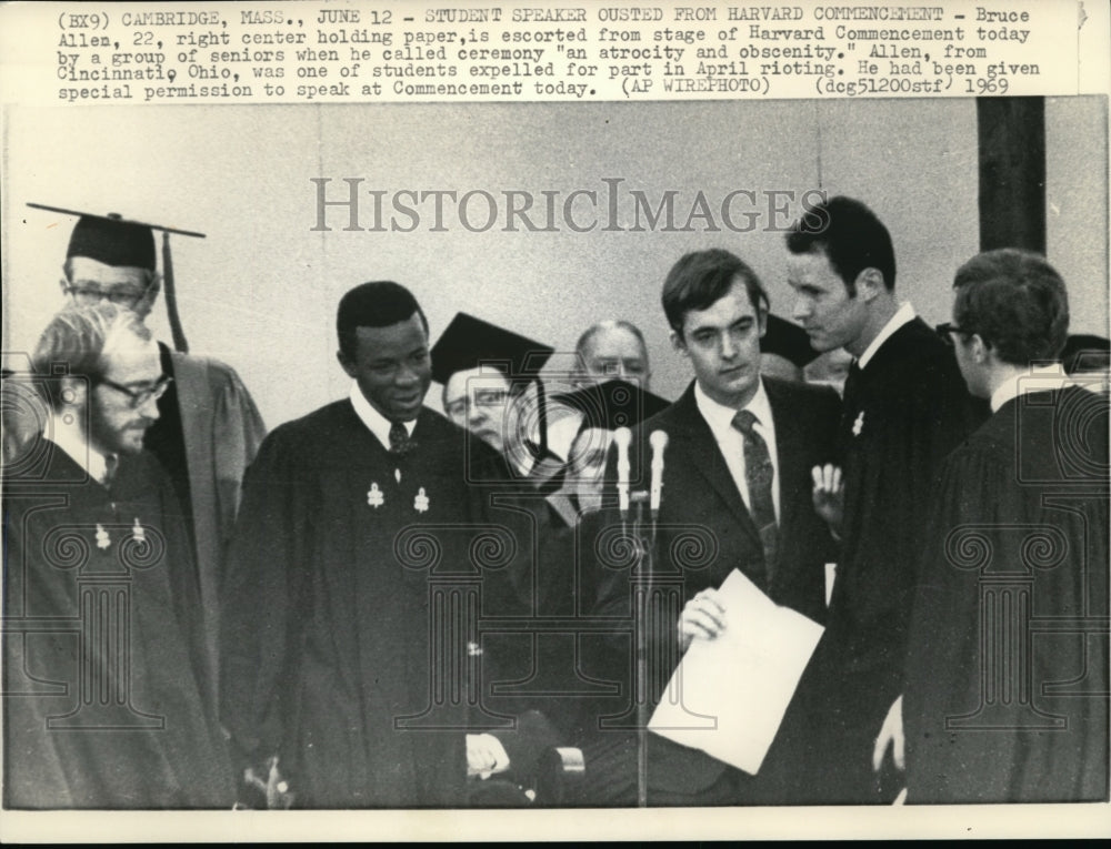 1969 Wire Photo Bruce Allen escorted from stage of Harvard Commencement - Historic Images