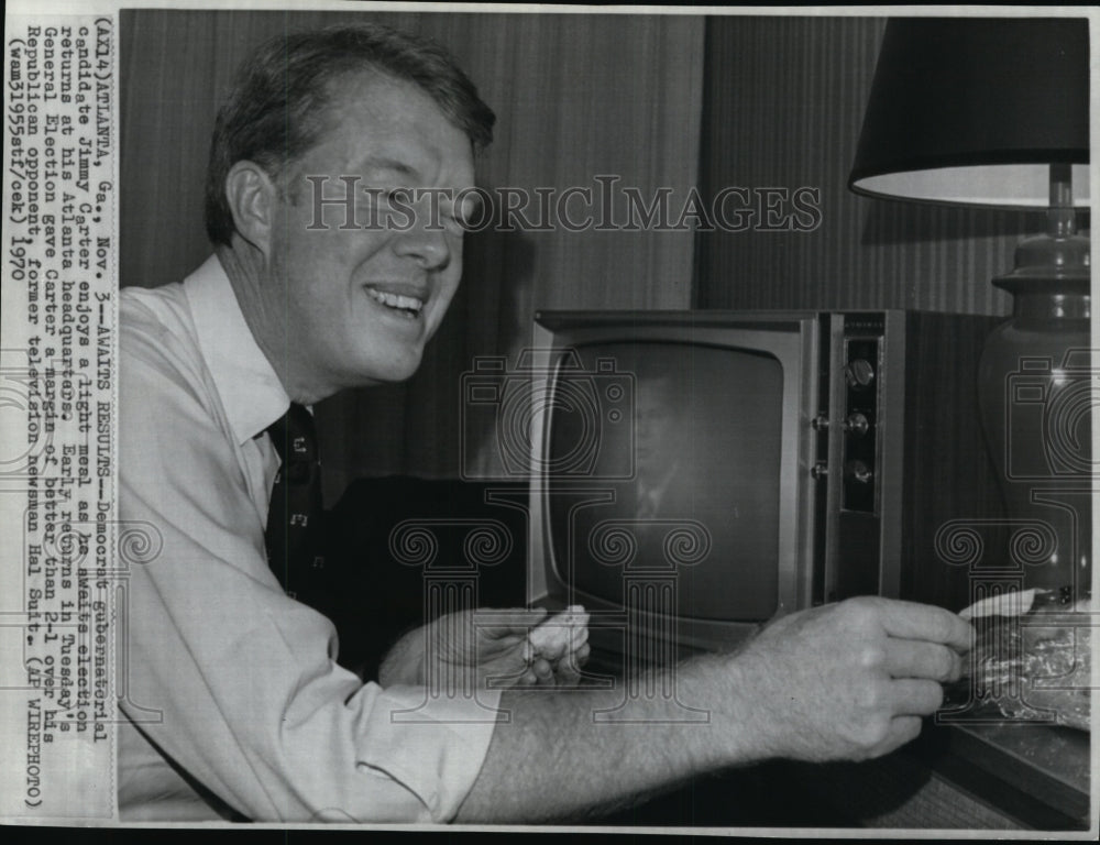 1970 Press Photo Carter enjoys light meal while waiting for election turns - Historic Images