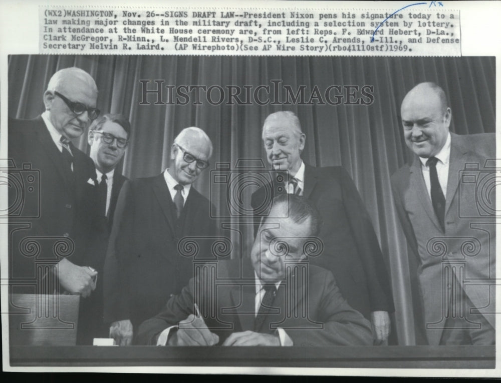 1969 Press Photo Pres. Richard Nixon signed a law with major changes in military-Historic Images