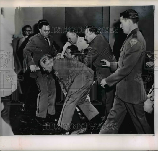 1961 Press Photo United Nations Guard Drags Heckler Through Hall - cvw18172 - Historic Images