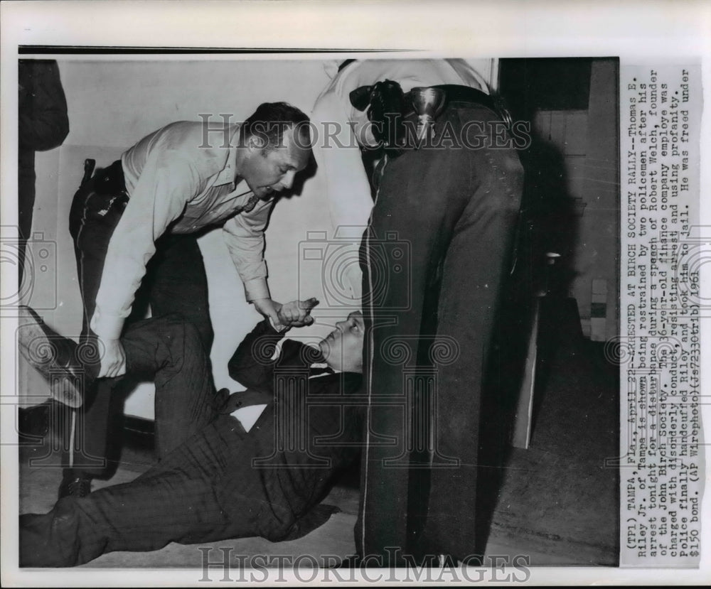 1961 Press Photo Arrested by Birch Society Rally - cvw18179 - Historic Images