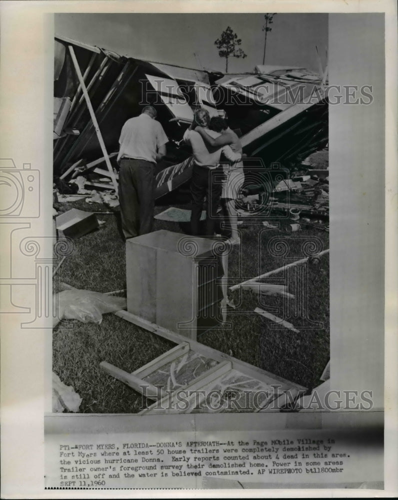 1960 Press Photo Residents survey damage at the Page Mobile Village - cvw18562 - Historic Images