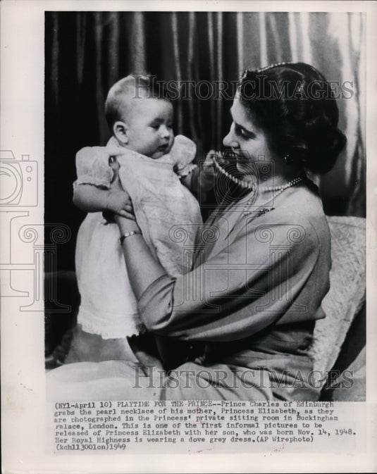 1949 Press Photo Prince Charles Grabs Pearl Necklace of Princess Elizabeth - Historic Images