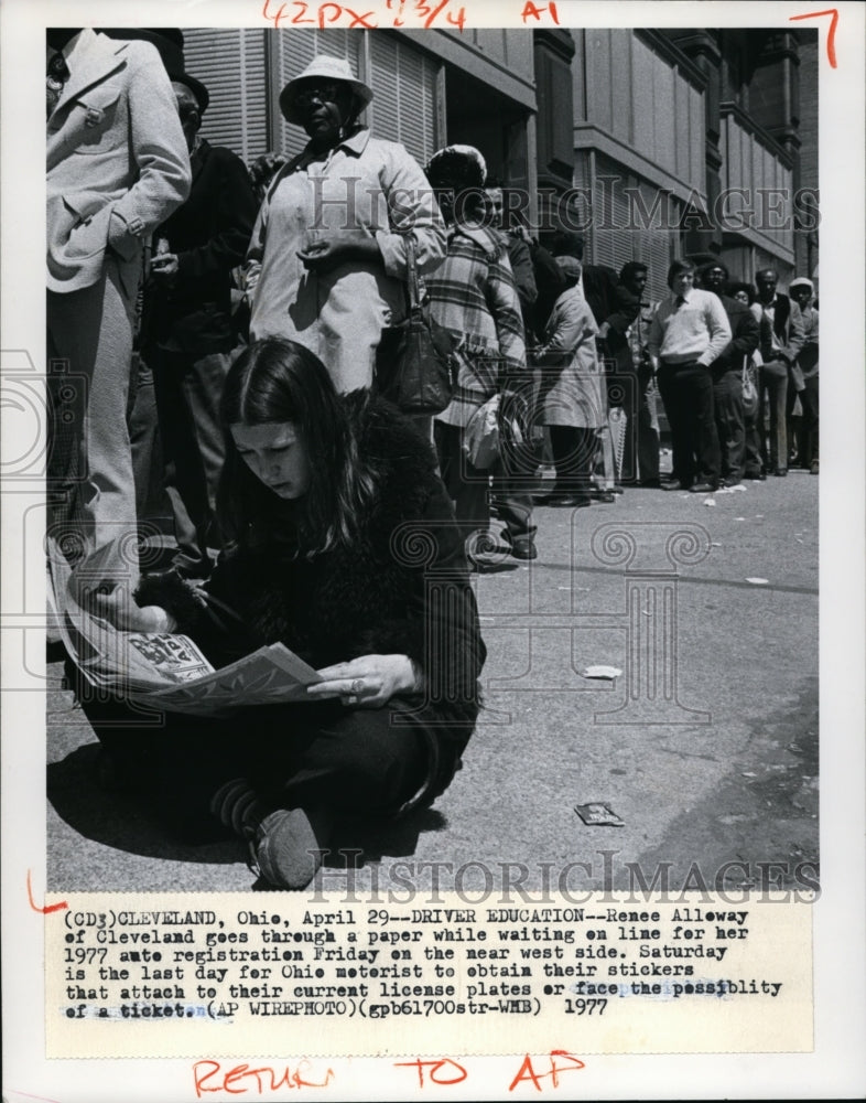 1977 Renee Alleway waits on line for auto registration in Cleveland - Historic Images