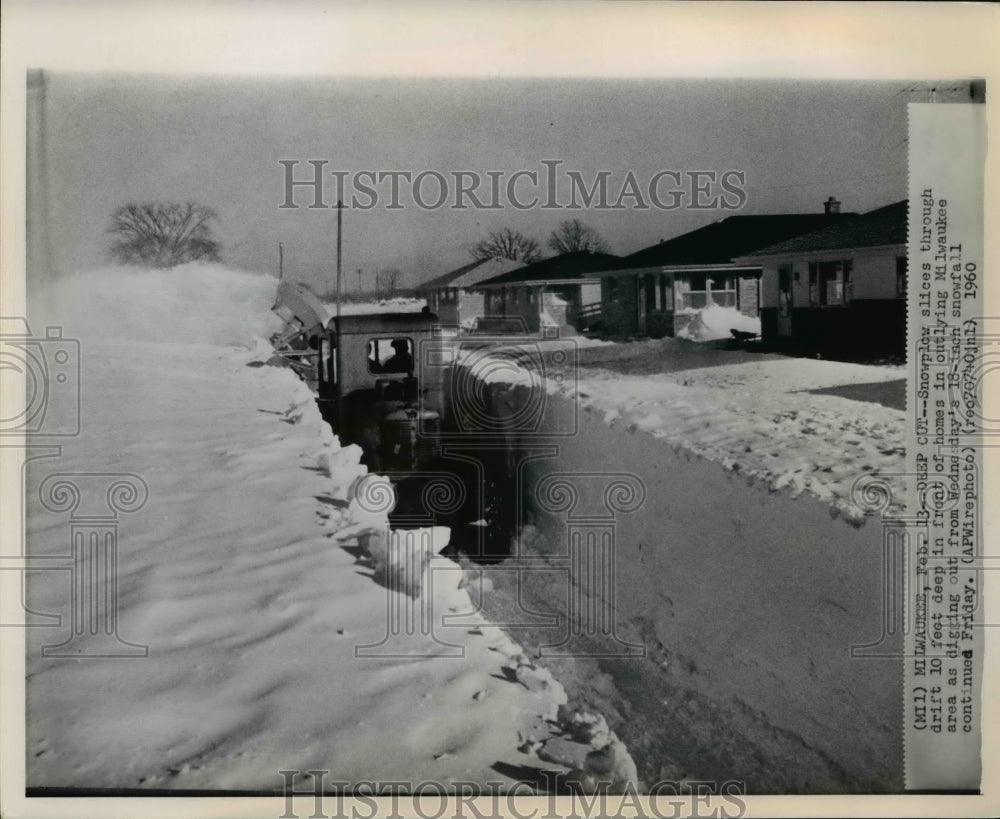 1961 Press Photo Snowplow slicing through drift in front of homes in Milwaukee-Historic Images