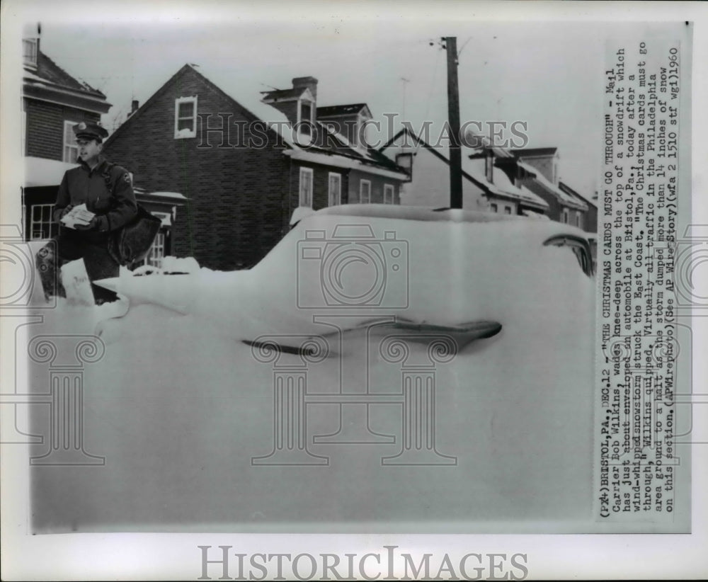 1961 Press Photo Mail Carrier Bob Wilkins continues work despite heavy snow - Historic Images