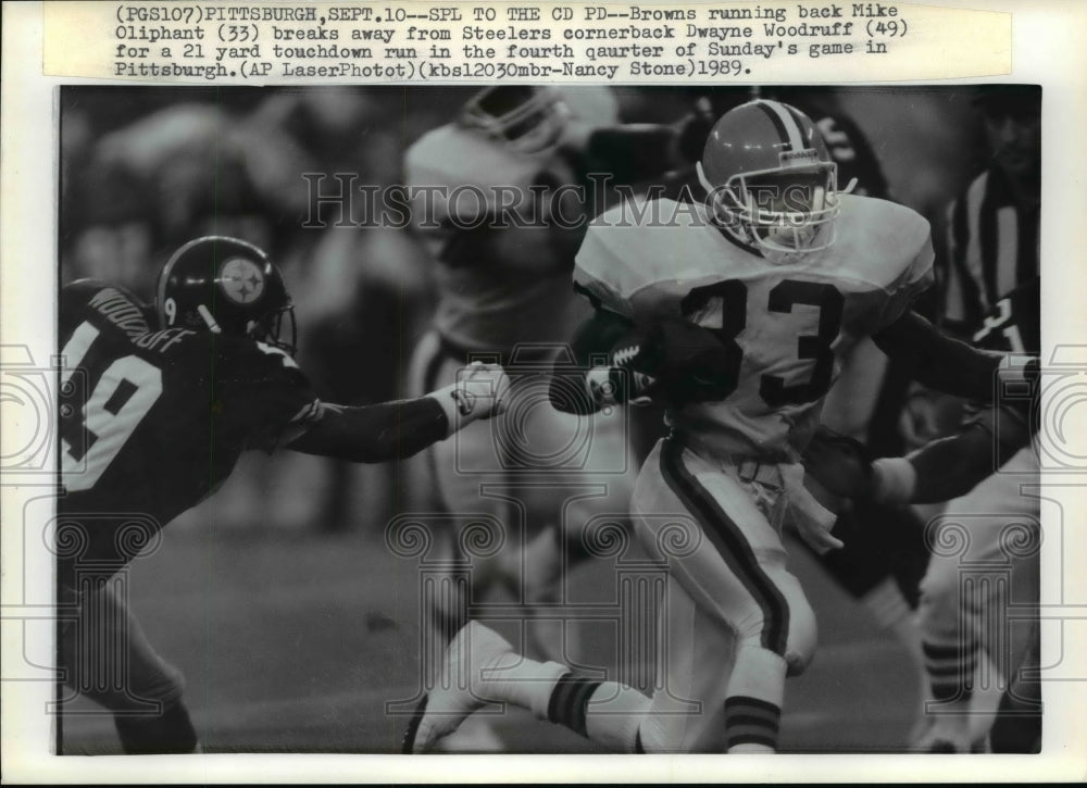 1989 Browns running back Mike Olophant breaks Steelers defense - Historic Images