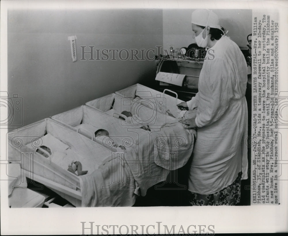 1952 Mrs William Pinkham bids temporary goodbye to her quadruplets - Historic Images