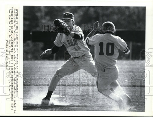 Cardinal's Jason Smith makes it to second base at Hawkin School - Historic Images