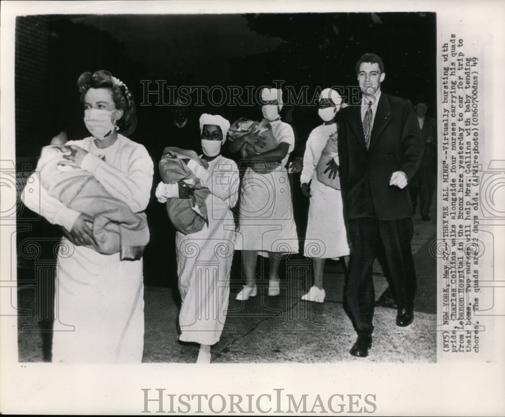 1949 Press Photo Charles Collins with the help of 4 nurses carry his quadruplets - Historic Images