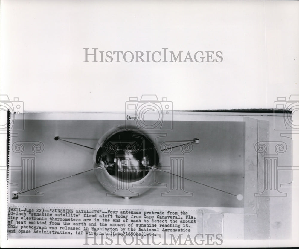 1959 Four antennas protrude from 20-inch "sunshine satellite"-Historic Images