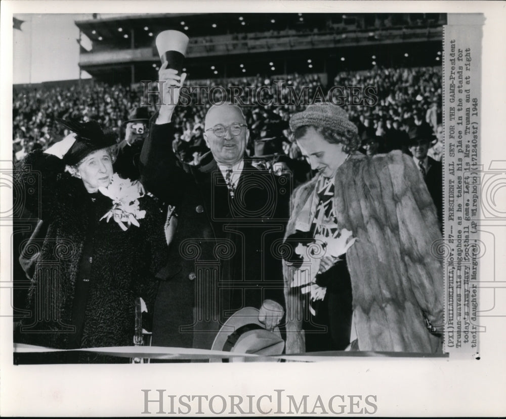 1948 Pres. Truman with his family at the Army Navy football game - Historic Images