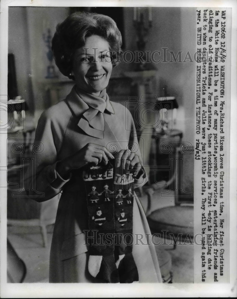 1969 Press Photo Mrs. Nixon holds old Christmas stockings of her daughters-Historic Images