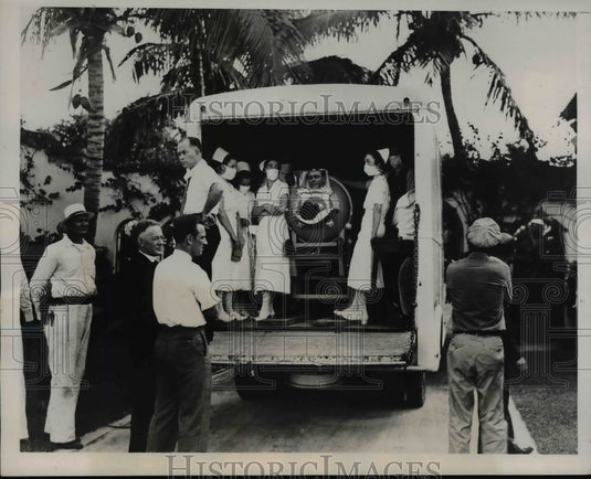 1937 Press Photo Infantile paralysis victim Fred Snite Jr. arrives in Miami home - Historic Images
